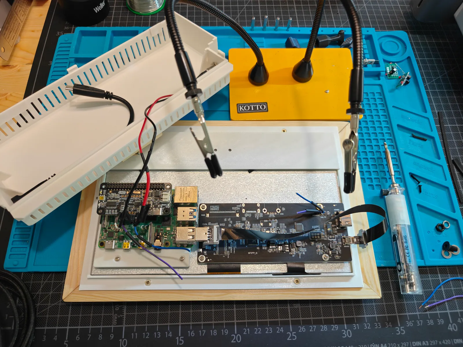 Photo of the dry-fitted electronics housing components